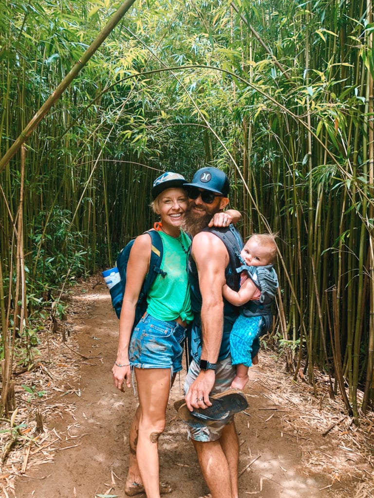 Family hiking Bamboo Forest, barefoot with a baby in Maui, Hawaii.