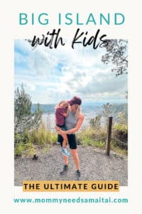 A graphic that reads "Big Island With Kids, The Ultimate Guide" and a photo of a mom holding her son at Volcanoes National Park on the Big Island of Hawaii