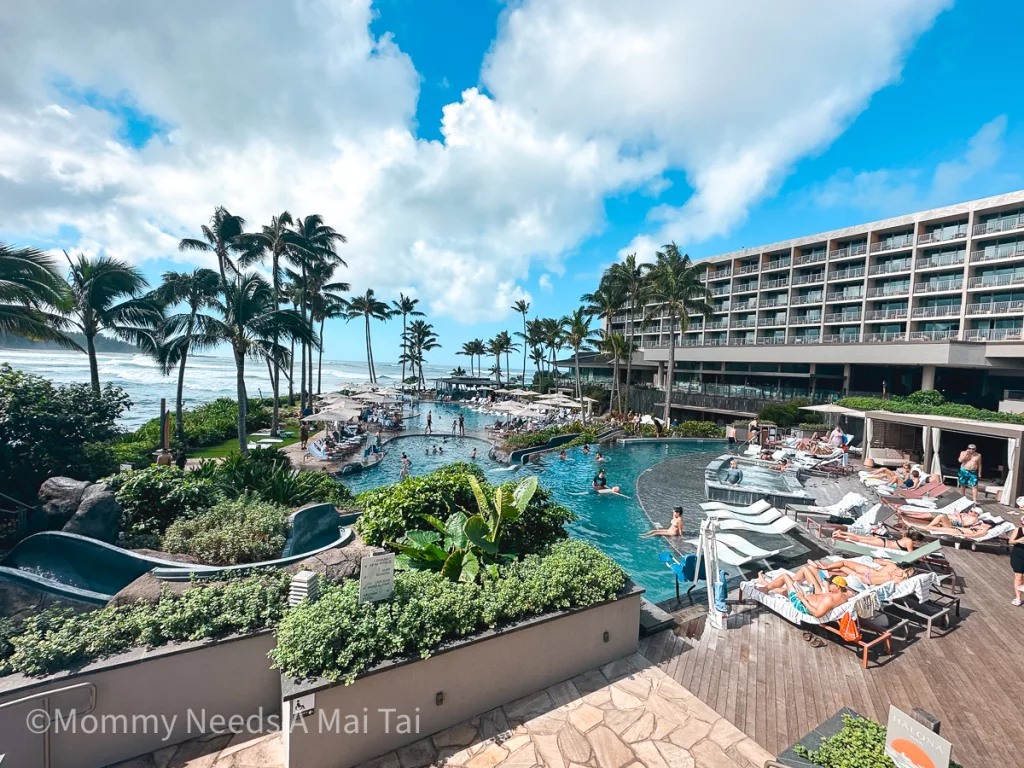 A high vantage point of the adult, kids, and main pool at Turtle Bay Resort, Oahu.