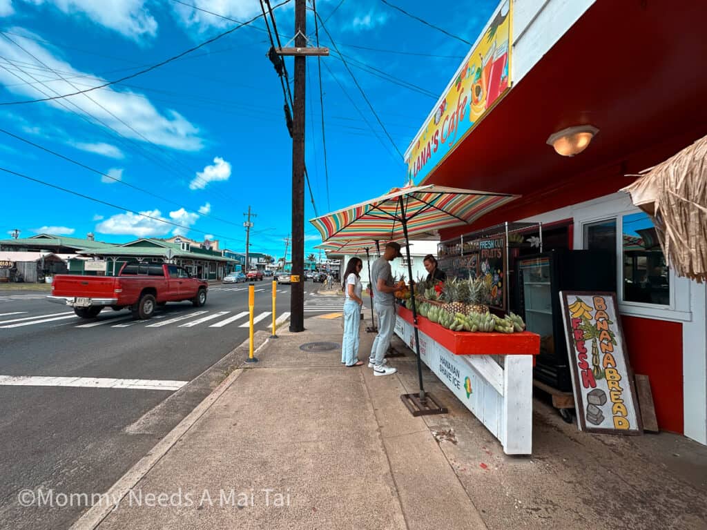 A white and red fruit stand in Kapa'a, Kauai.